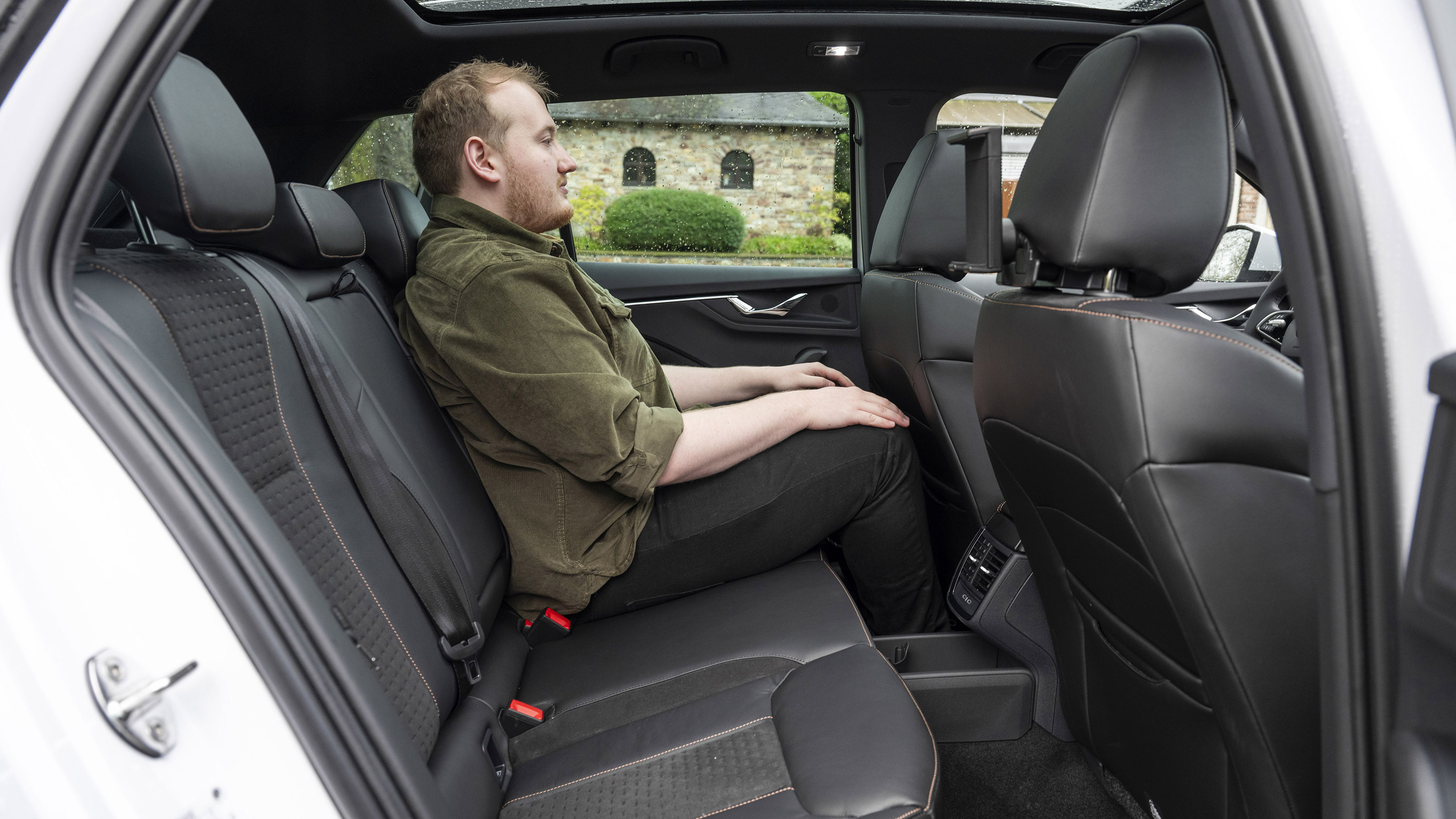 Ellis Hyde sitting in the Skoda Kamiq