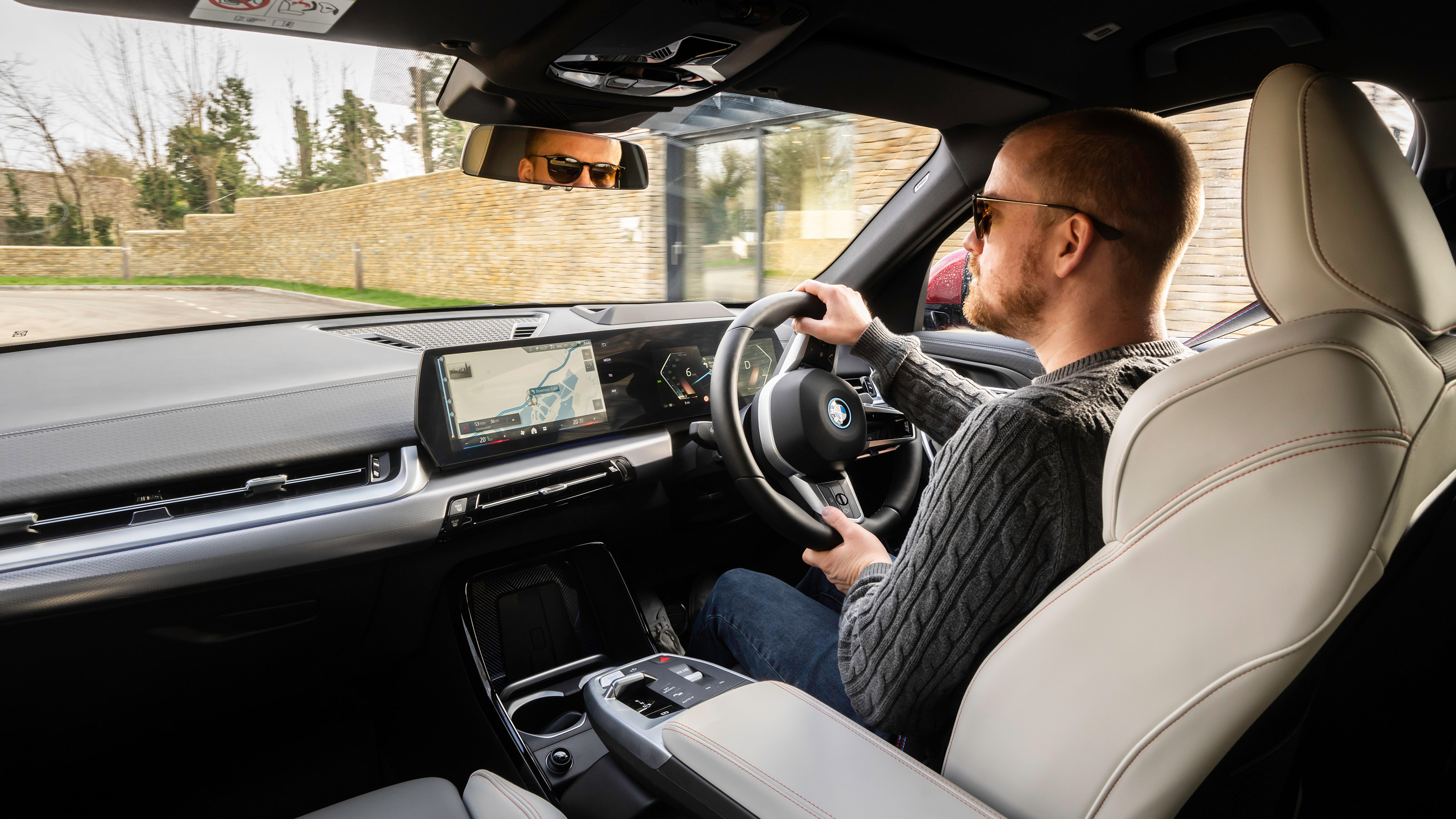 Alex Ingram driving the BMW iX2 xDrive30 M Sport