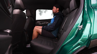 Auto Express photographer Otis Clay sitting in the Alfa Romeo Tonale's back seat