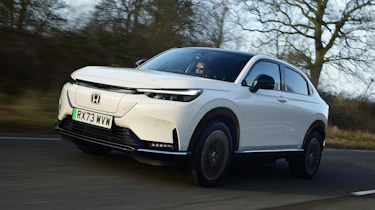 Honda e:Ny1 vs Hyundai Kona Electric - Honda e:Ny1 front tracking