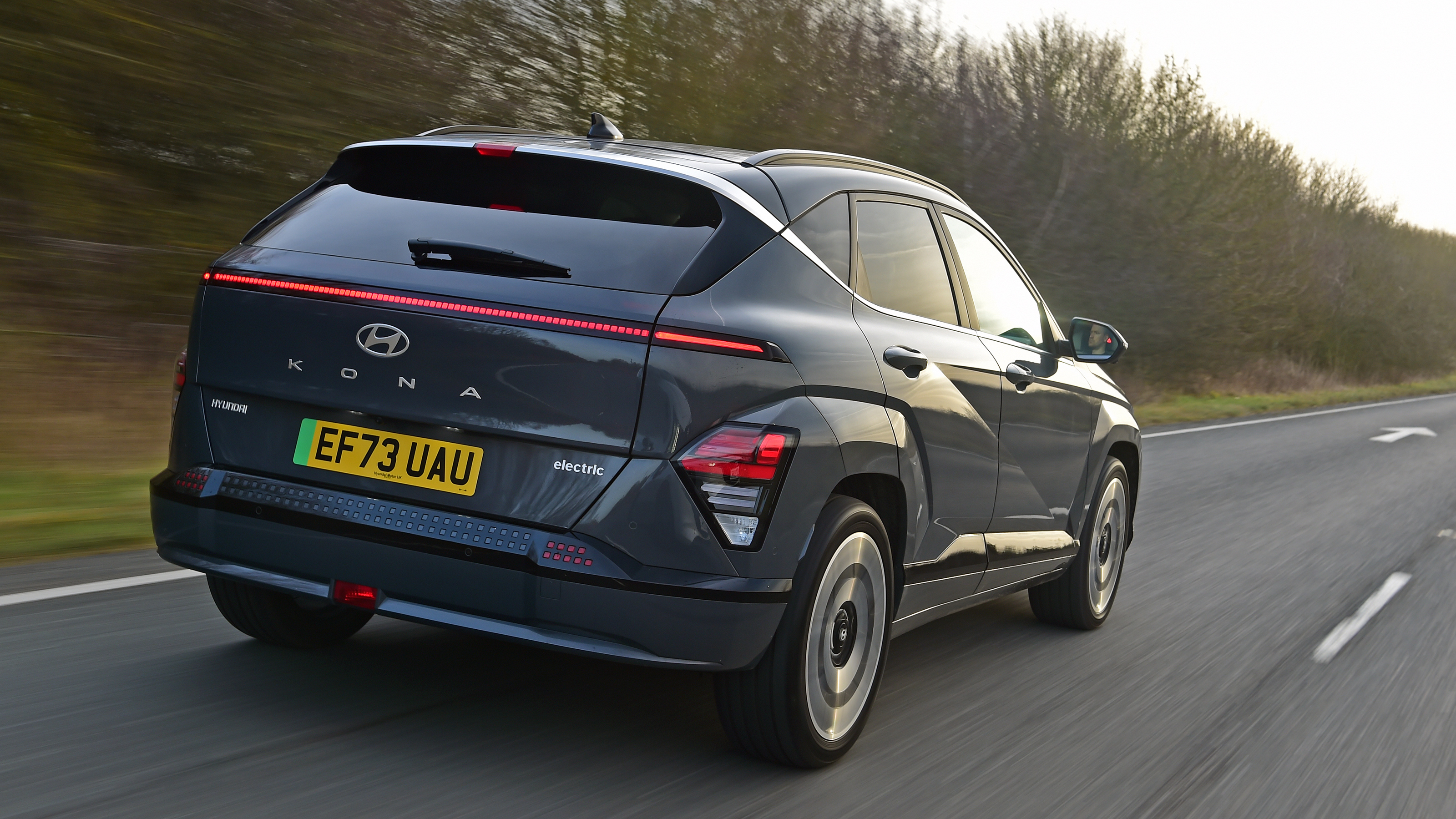 Honda e:Ny1 vs Hyundai Kona Electric - Hyundai Kona Electric rear tracking 