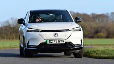 Honda e:Ny1 vs Hyundai Kona Electric - Honda e:Ny1 front cornering