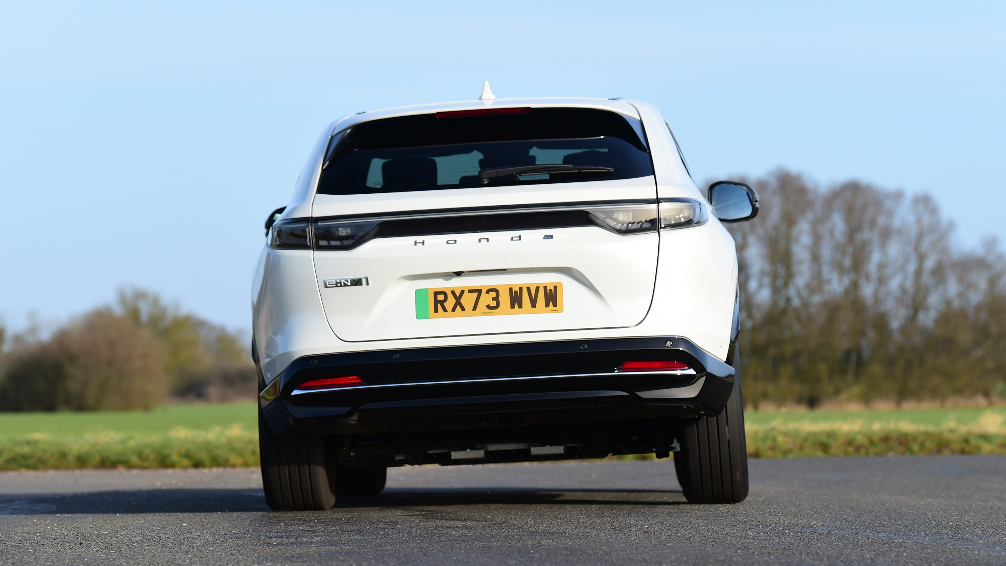 Honda e:Ny1 vs Hyundai Kona Electric - Honda e:Ny1 rear cornering 