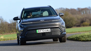 Honda e:Ny1 vs Hyundai Kona Electric - Hyundai Kona Electric front cornering