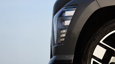 Honda e:Ny1 vs Hyundai Kona Electric - Hyundai Kona Electric front headlight