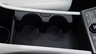 Honda e:Ny1 vs Hyundai Kona Electric - Hyundai Kona Electric front cupholders