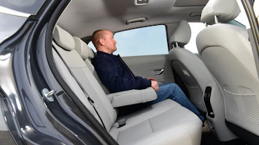 Honda e:Ny1 vs Hyundai Kona Electric - Hyundai Kona Electric rear seats with Auto Express chief reviewer, Alex Ingram