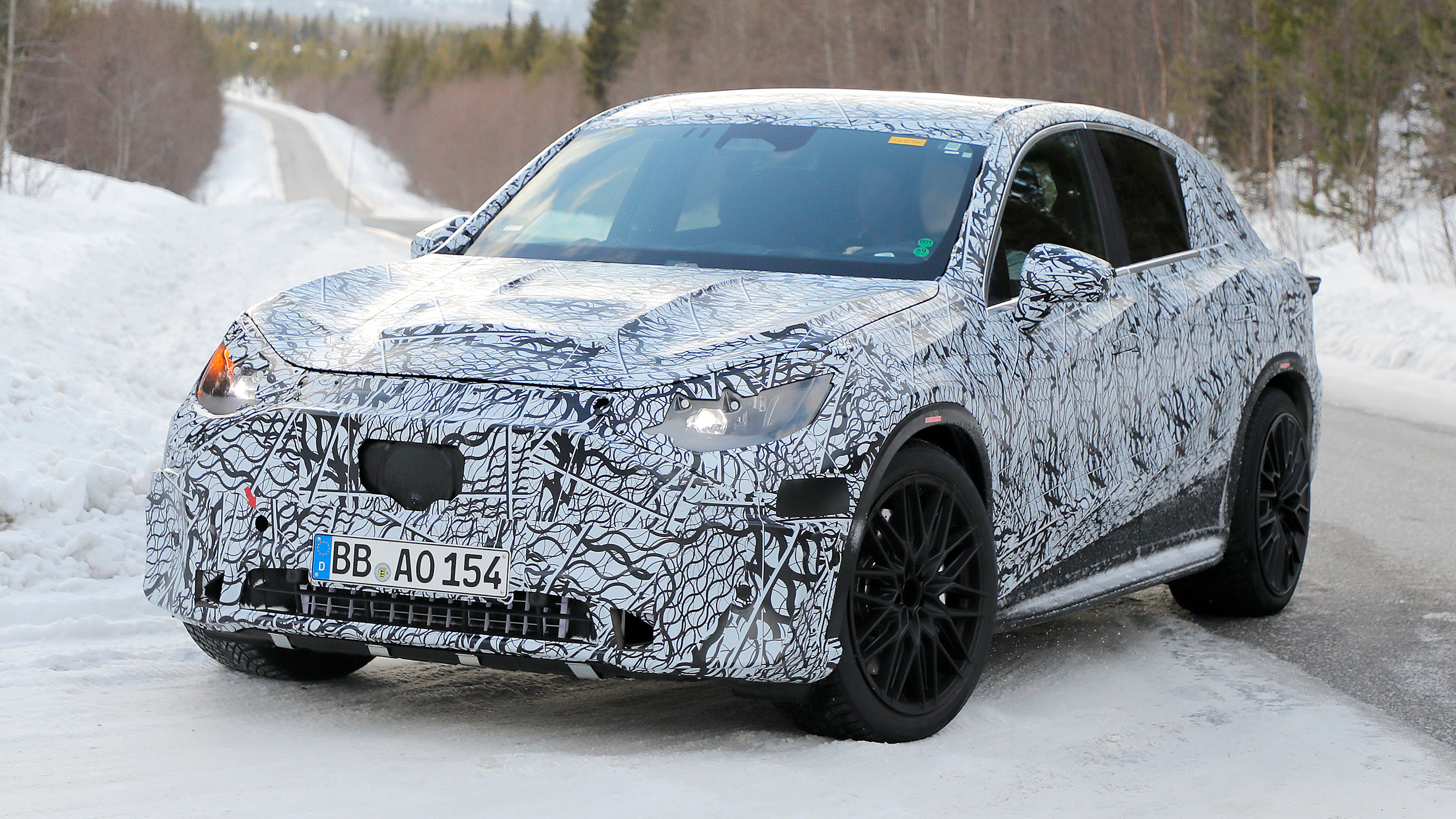 Mercedes EQC (camouflaged test car) - front cornering