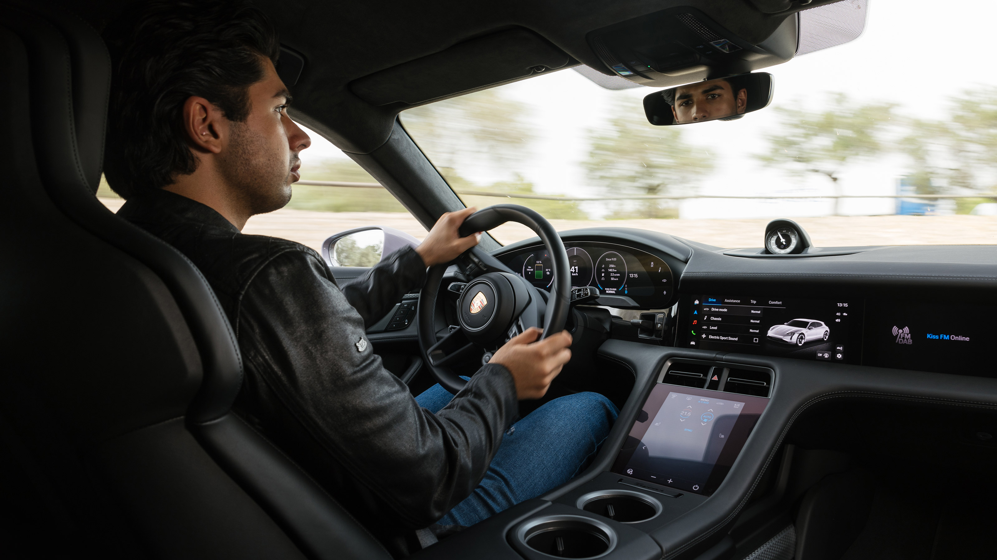 Yousuf Ashraf driving the Porsche Taycan 4S facelift