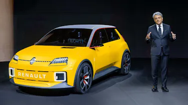 Renault boss, Luca de Meo, stood next to Renault 5