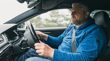 Chris Rosamond driving the armoured Skoda Superb Estate
