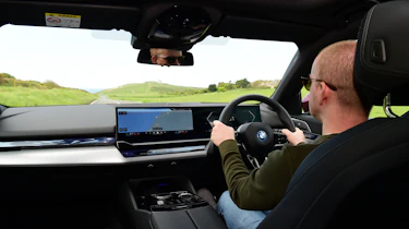 Auto Express chief reviewer Alex Ingram driving the BMW 530e