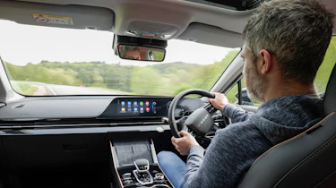 2024 Omoda 5 prototype - interior driving shot with Auto Express deputy editor, Richard Ingram