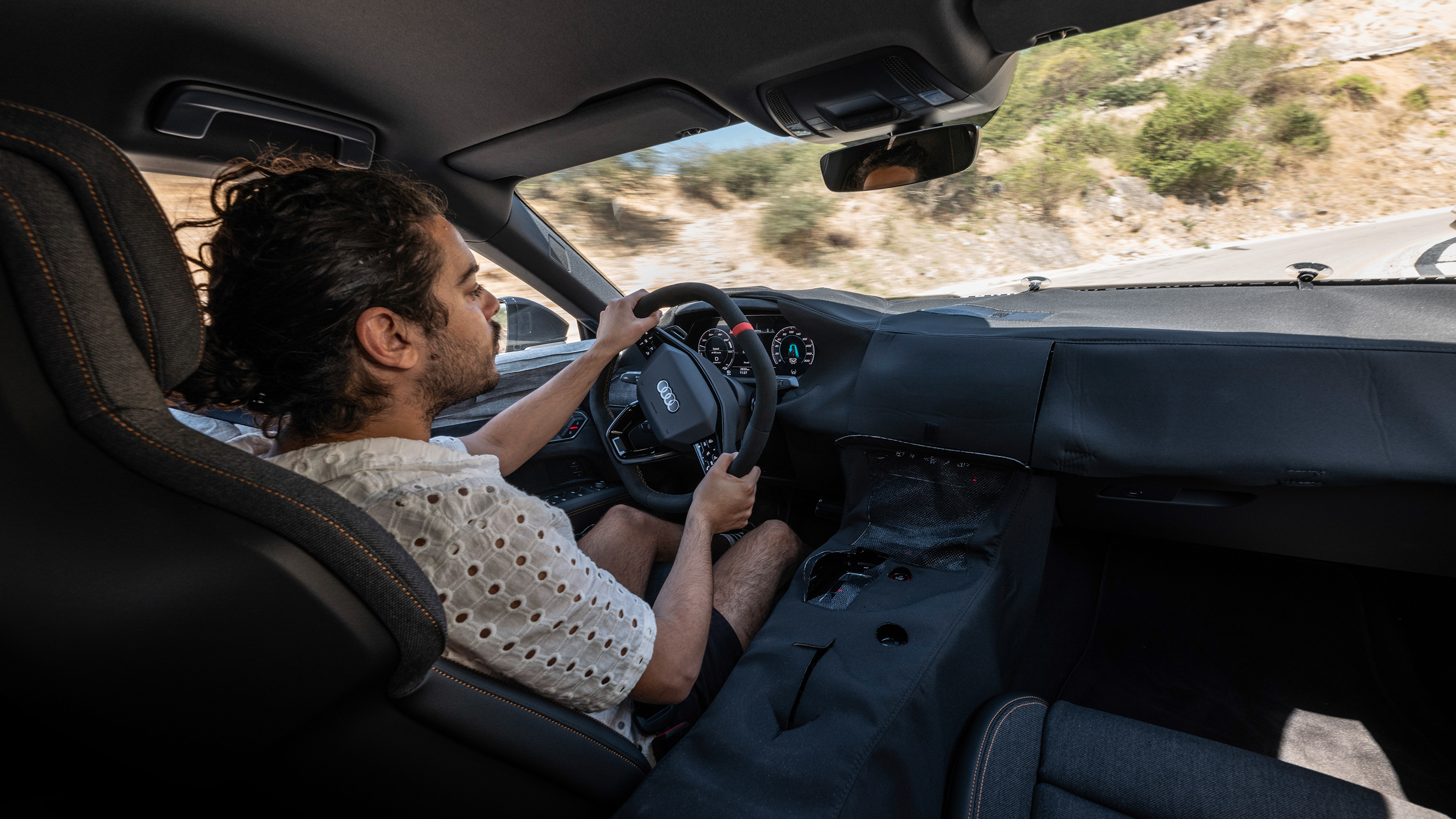 Auto Express senior staff writer Jordan Katsianis driving the Audi e-tron GT prototype