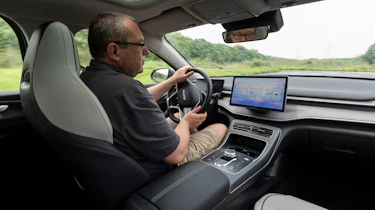 John McIlroy driving the BYD Seal 5 DM-i