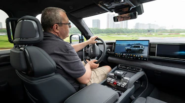 John McIlroy driving the FangChengBao 5
