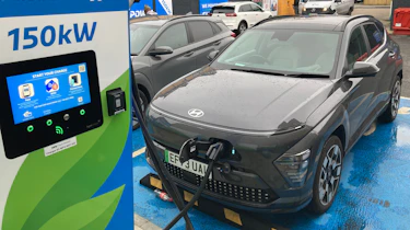 Hyundai Kona Electric connected to a rapid-charging station