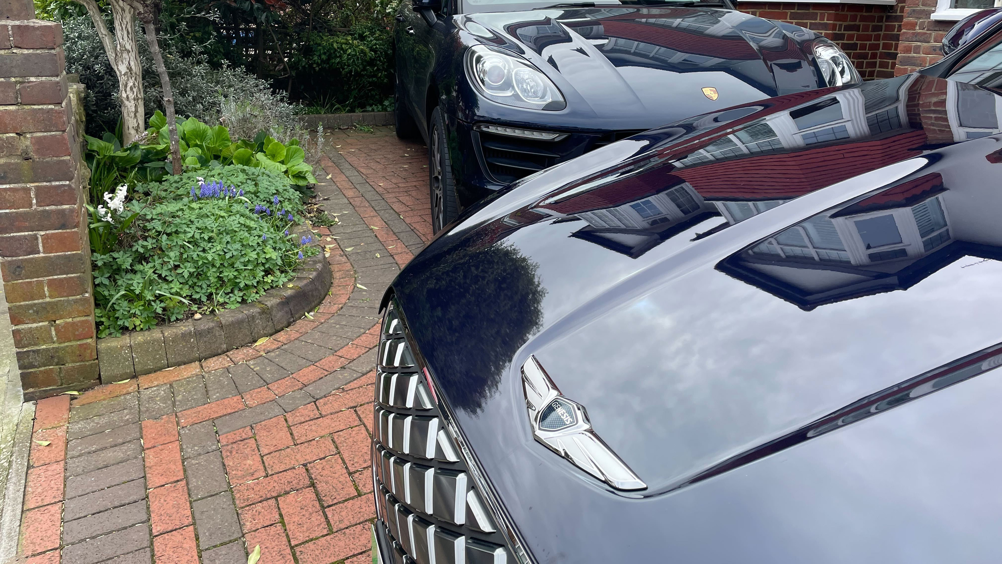 Genesis Electrified GV70 and Porsche Macan - front ends