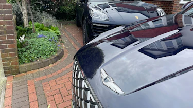 Genesis Electrified GV70 and Porsche Macan - front ends