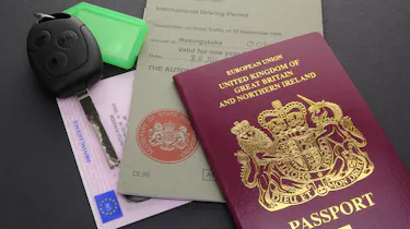 Car key, driving licence, passport and International Driving Permit