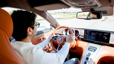 New ORA 07 - interior driving shot with Auto Express senior staff writer Jordan Katsianis