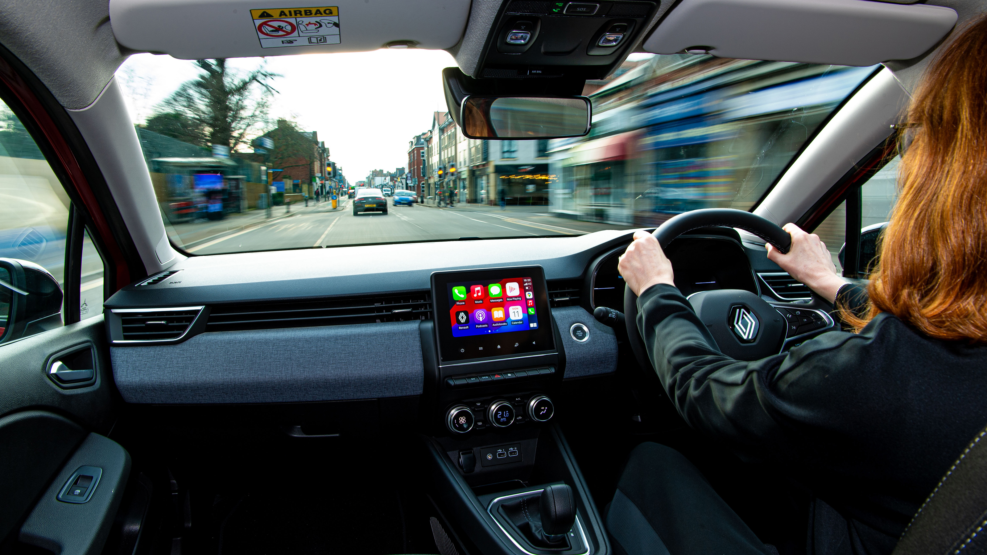 Auto Express pictures editor Dawn Grant driving the Renault Clio E-Tech