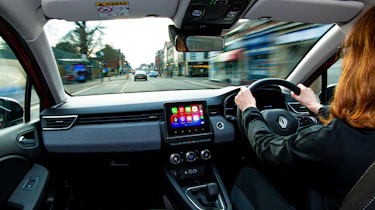 Auto Express pictures editor Dawn Grant driving the Renault Clio E-Tech