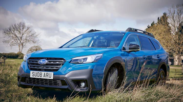 Subaru Outback Touring X - front cornering off-road