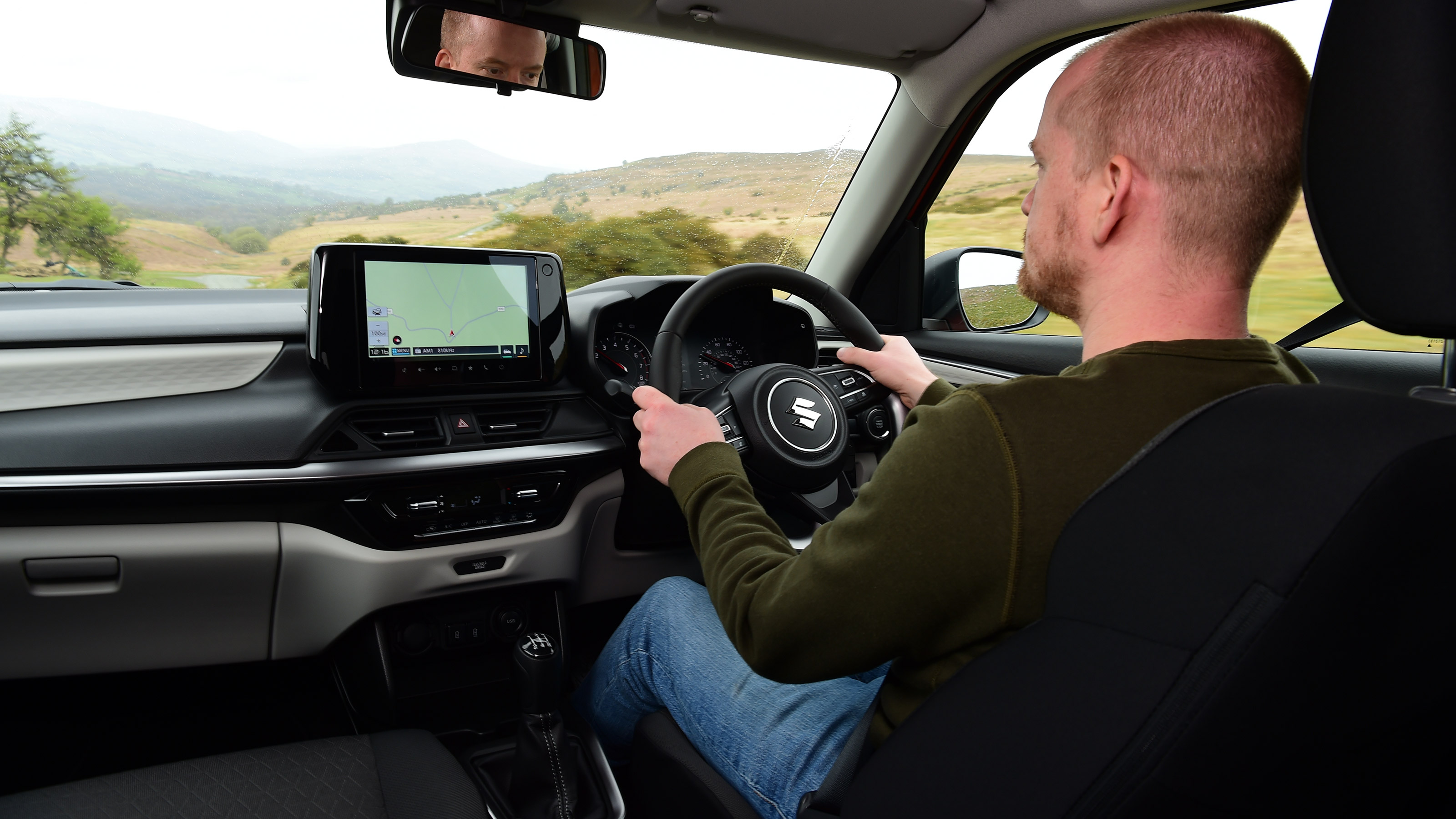 Alex Ingram driving the Suzuki Swift