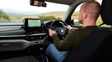 Alex Ingram driving the Suzuki Swift