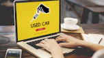 "Used car" graphic on laptop