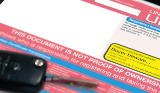 V5C document with car key