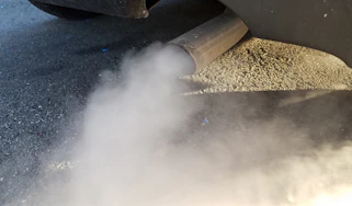 Car exhaust emitting white smoke