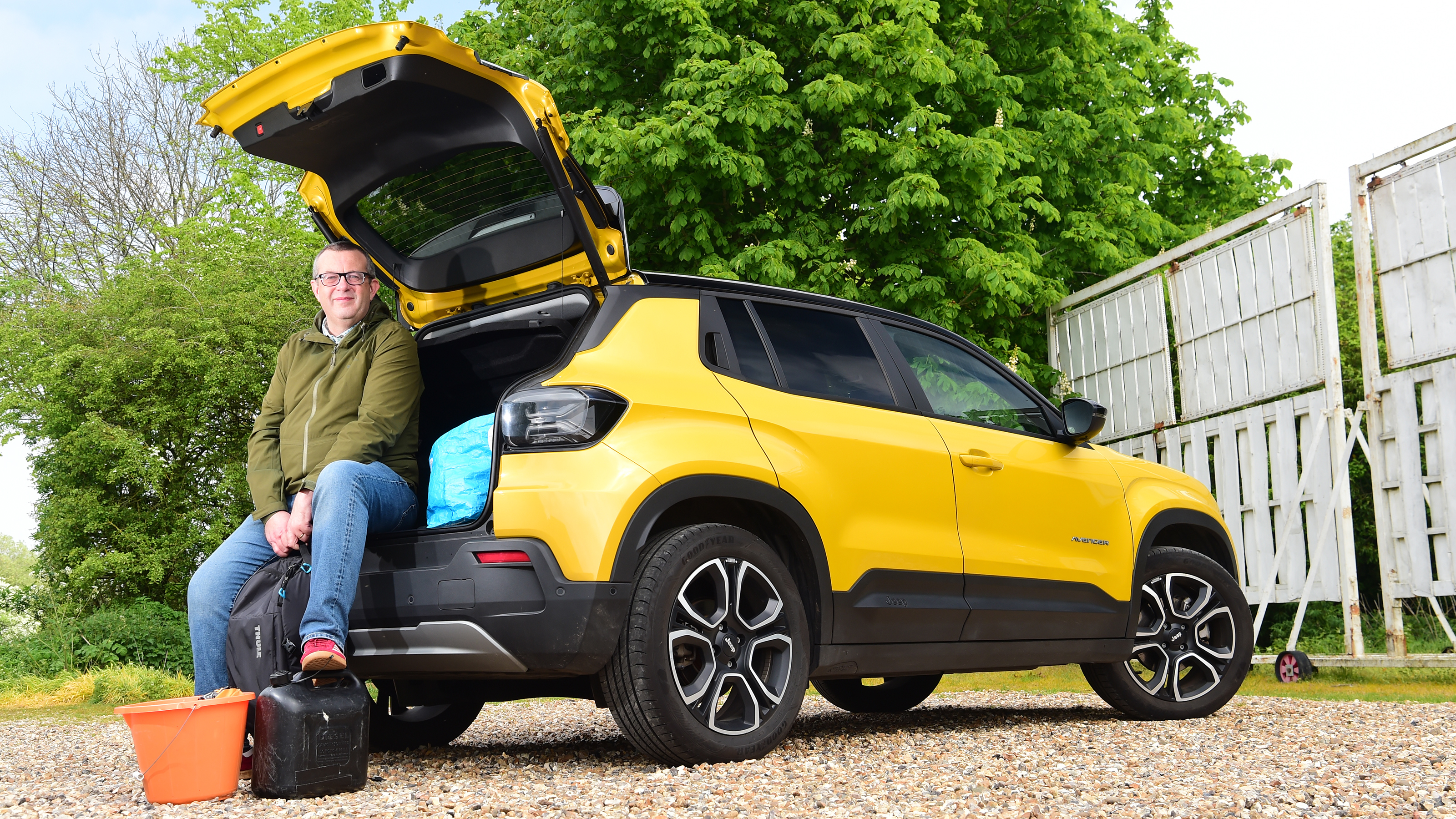 Auto Express editor-at-large John McIlroy sitting in the Jeep Avenger's boot