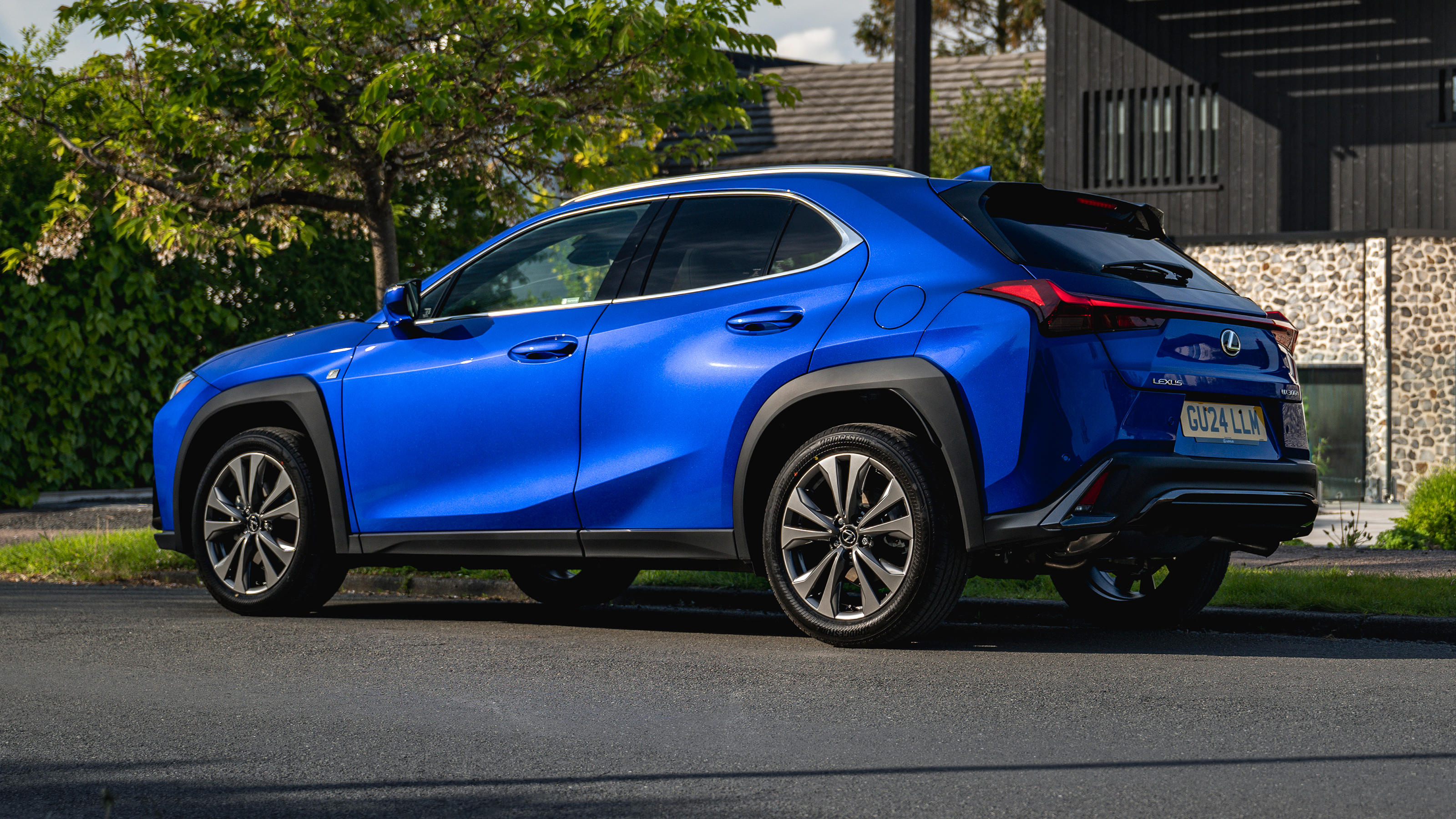 Lexus UX 350h+ F-Sport - rear 3/4 static