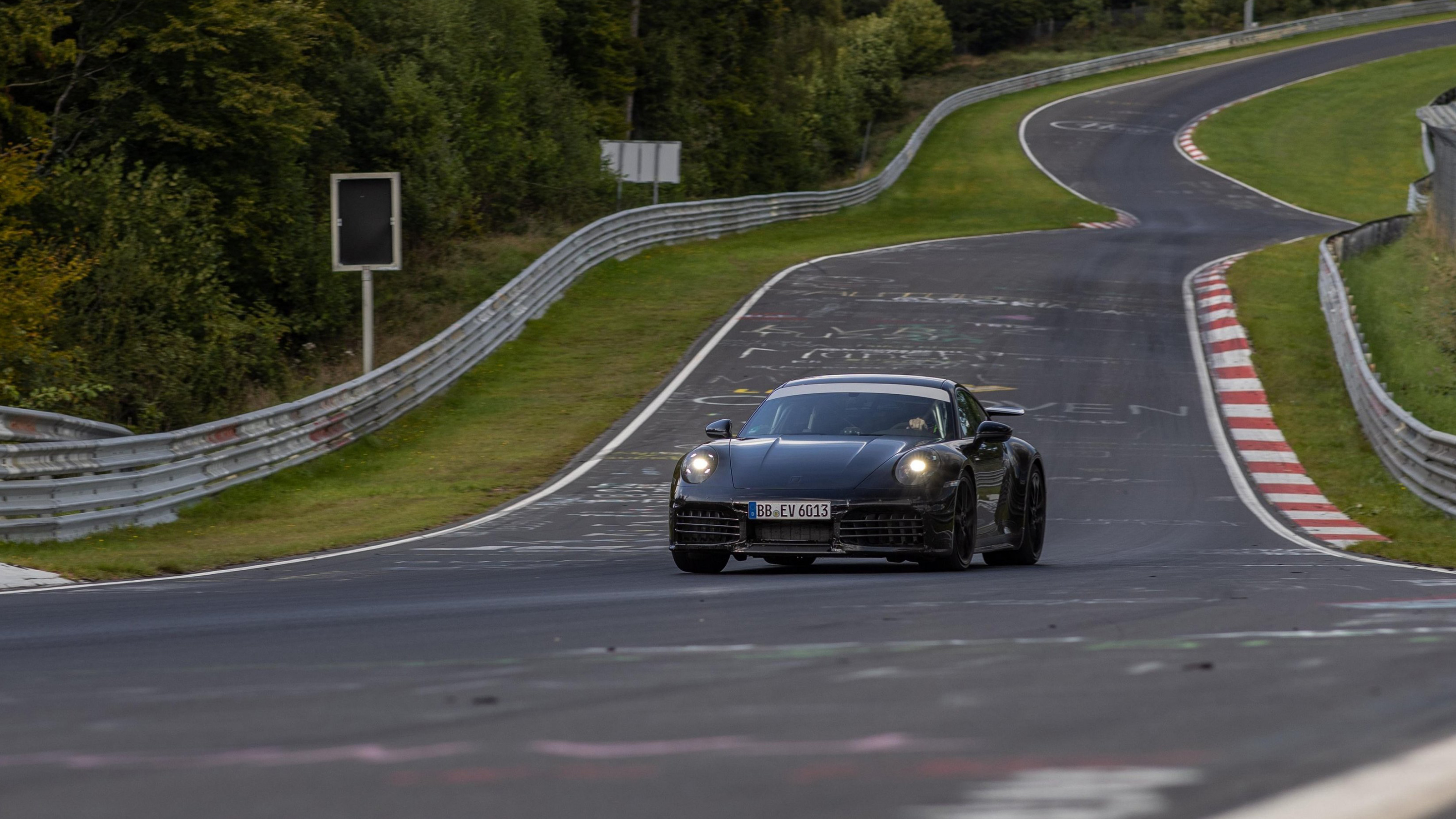 New Porsche 911 front 3/4 round a track