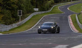 New Porsche 911 front 3/4 round a track