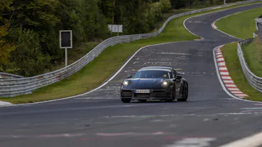 New Porsche 911 front 3/4 round a track