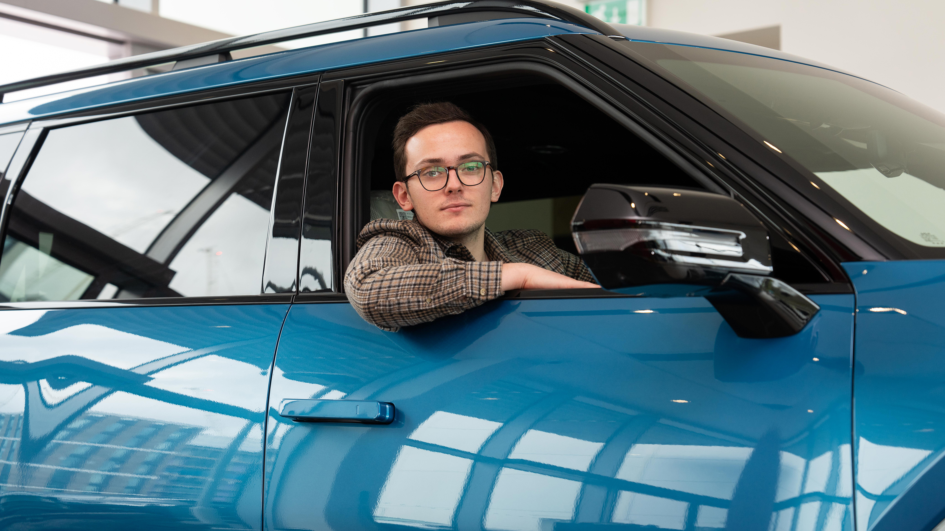 Tom Jervis driving a KIA EV9
