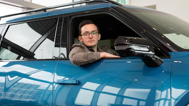 Tom Jervis driving a KIA EV9