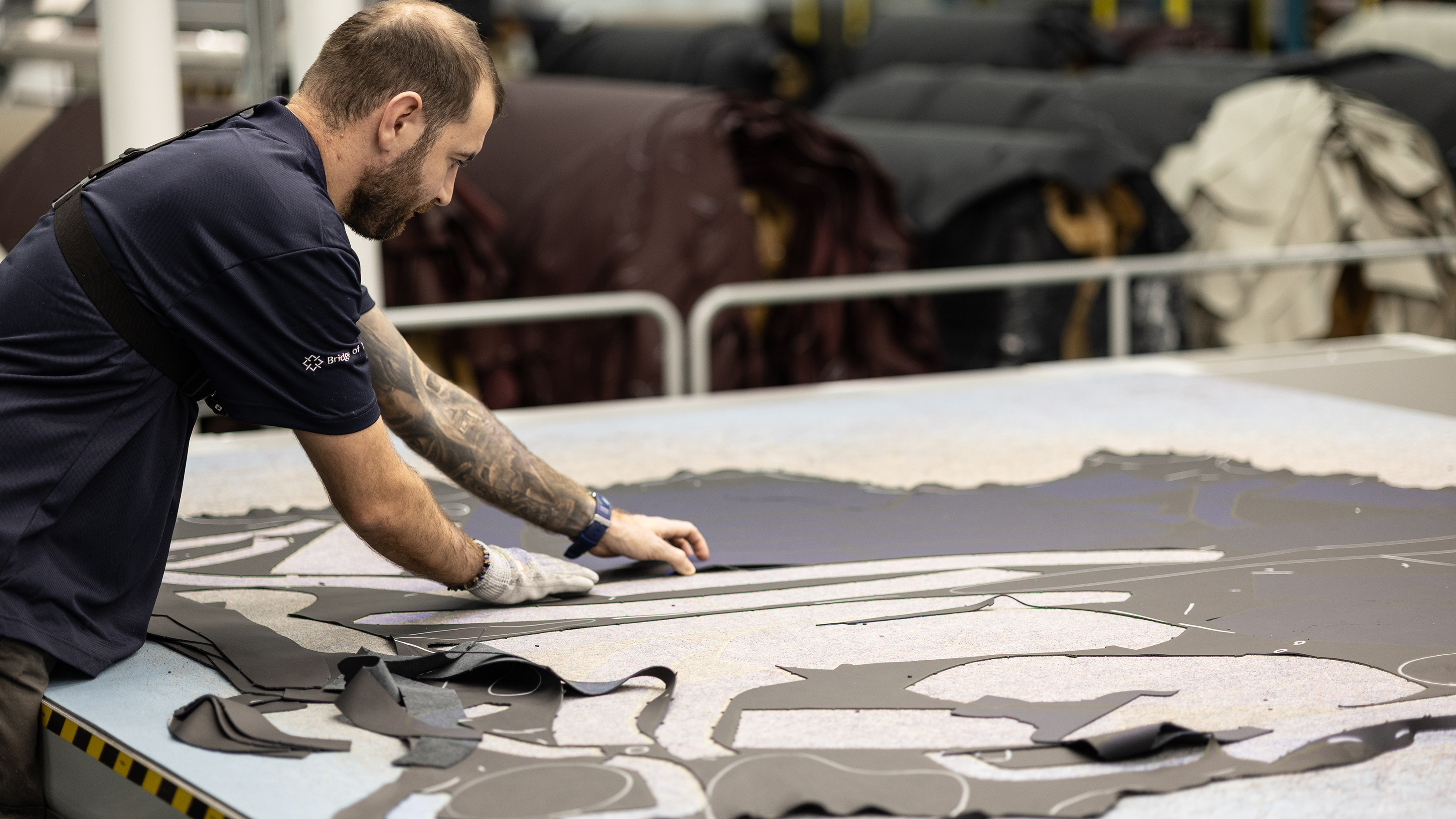 Bridge of Weir technician cutting leather