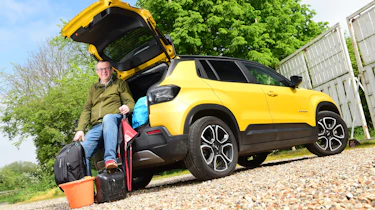Auto Express editor-at-large John McIlroy sitting in the Jeep Avenger's boot