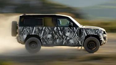 Land Rover Defender OCTA - side action