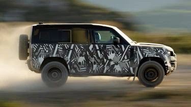Land Rover Defender OCTA - side action