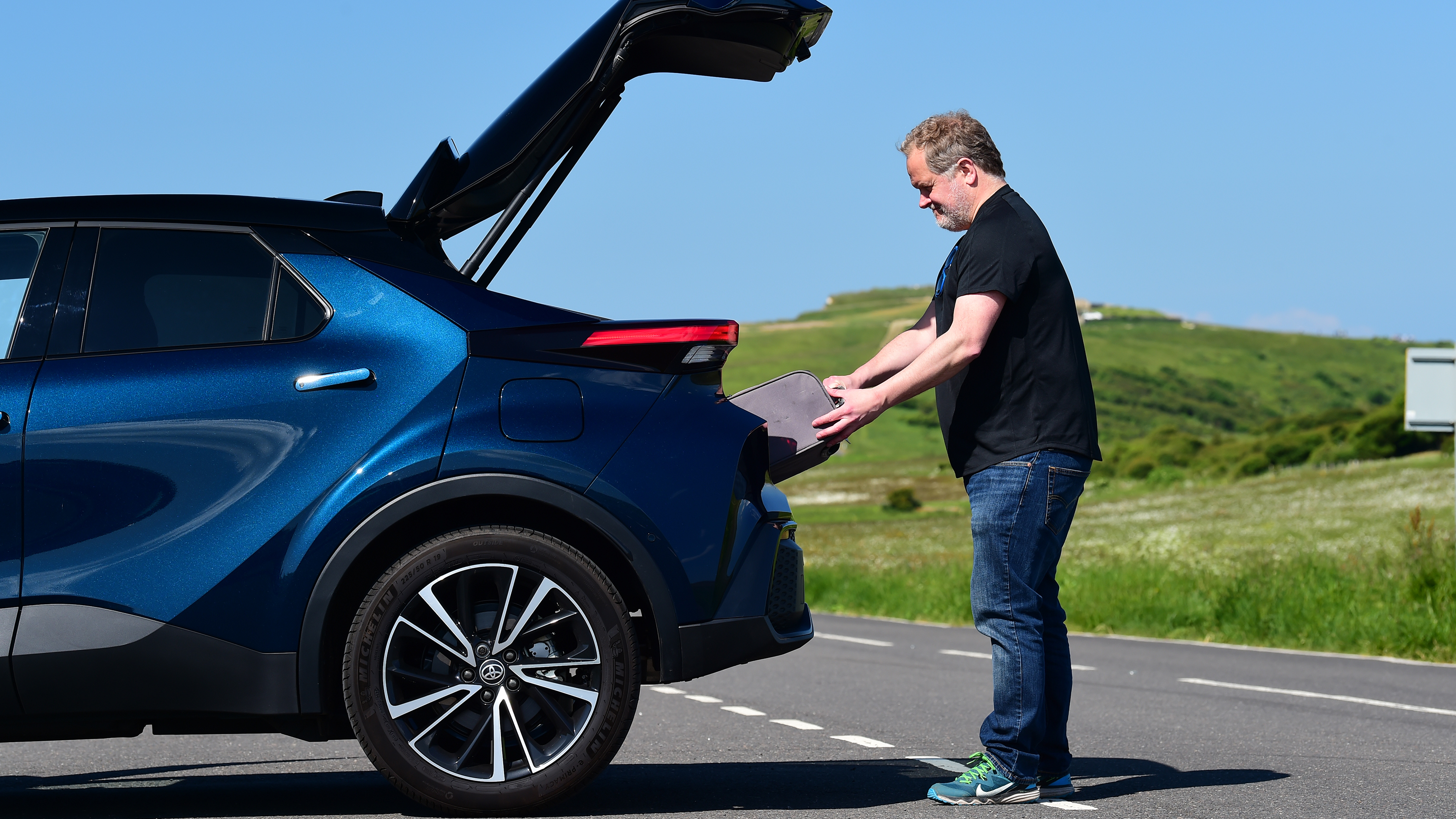 Auto Express commercial editor Paul Adam loading the Toyota C-HR Excel's boot