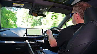 Auto Express commercial editor Paul Adam driving the Toyota C-HR Excel