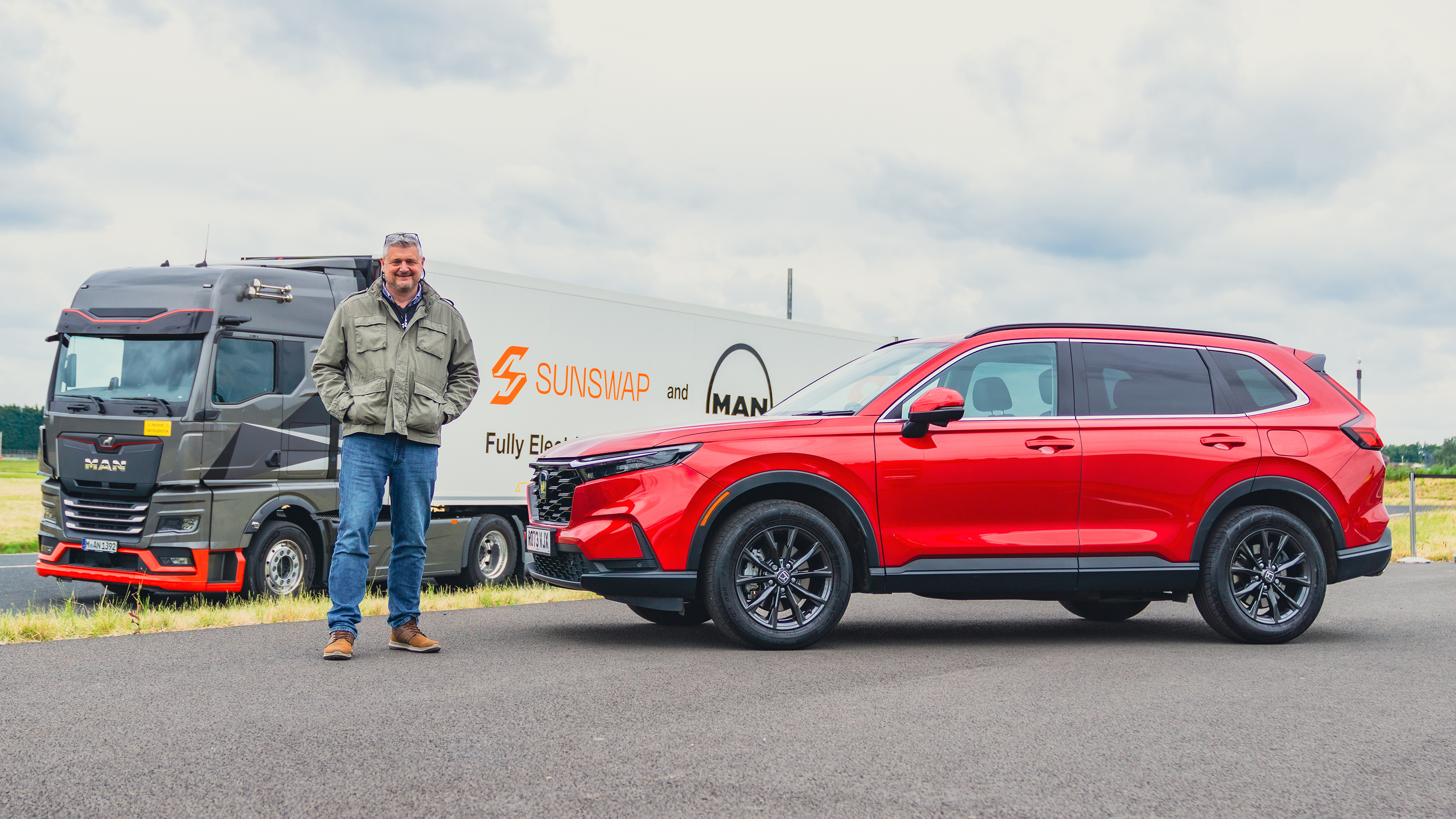 Auto Express consumer editor Chris Rosamond standing next to the Honda CR-V
