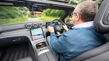 John McIlroy driving the Mercedes CLE 300 Cabriolet