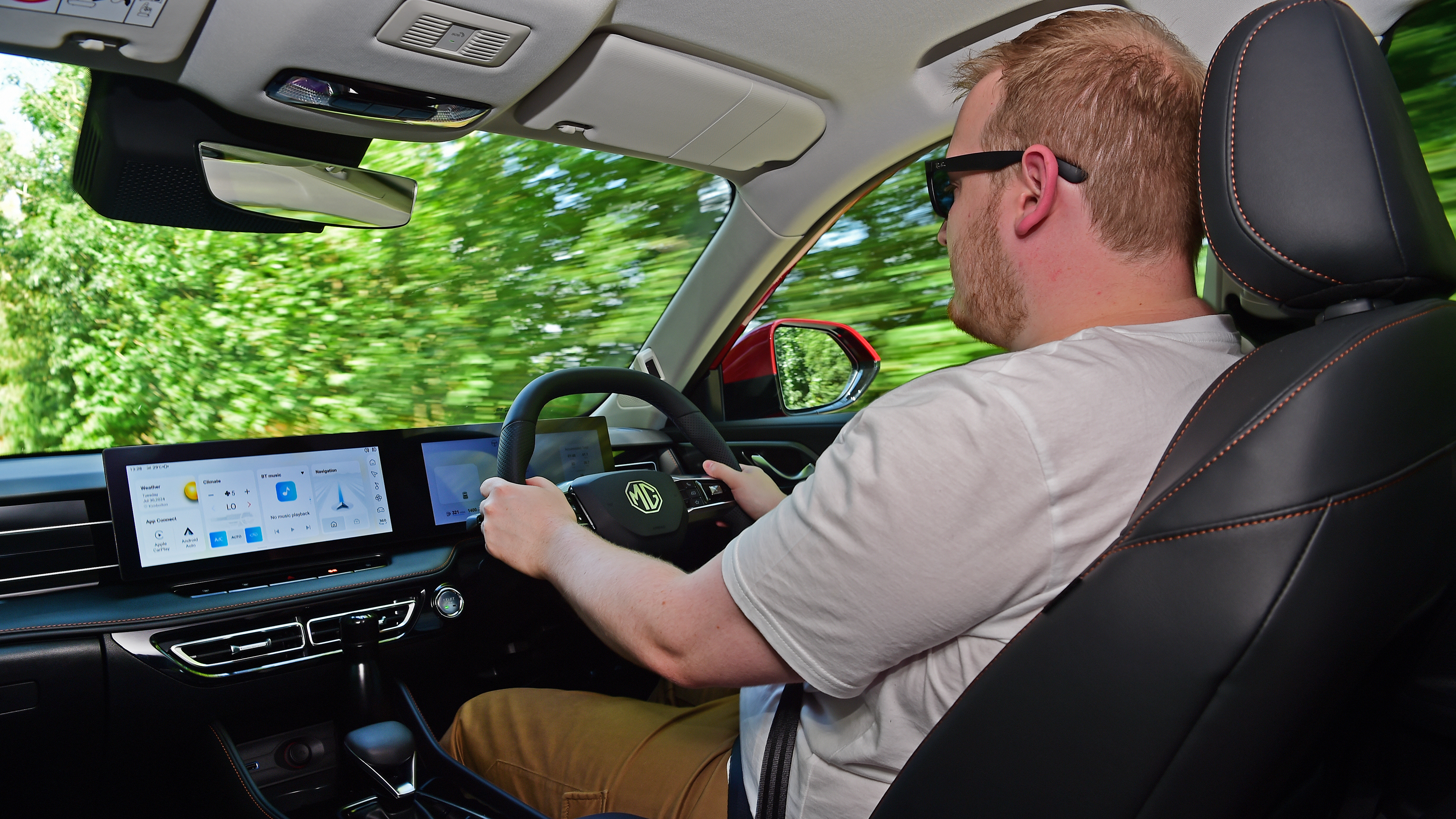 New MG HS - front interior driving shot with Auto Express news reporter Ellis Hyde 