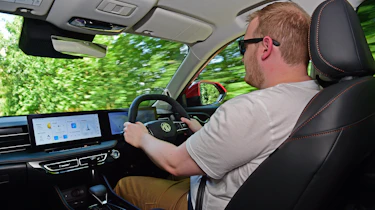 New MG HS - front interior driving shot with Auto Express news reporter Ellis Hyde